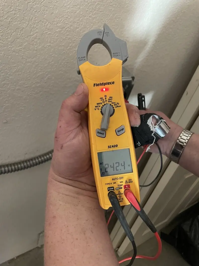 Voltage testing with clamp meter during Whole House Surge Protector in Wewoka